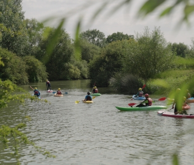Youths Kayaking on the river.