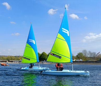 Two sailing boats on the water.