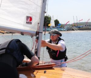 Someone having some private tuition on the lake.