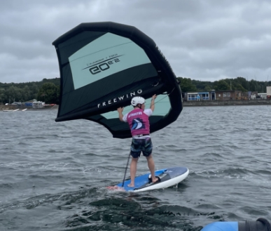 Someone Wingfoiling