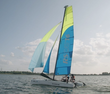 To people sailing in a Catamaran.
