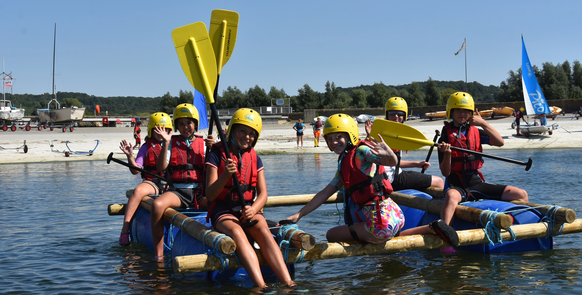 Children paddling on the lake.