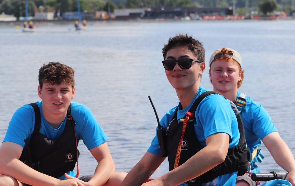 Baz and two others on a sailing boat.