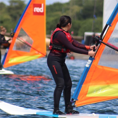 Start windsurfing.