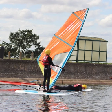 Someone windsurfing