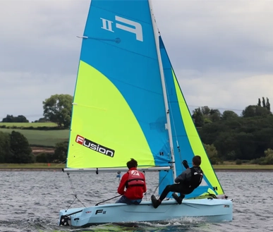 Two people out sailing.