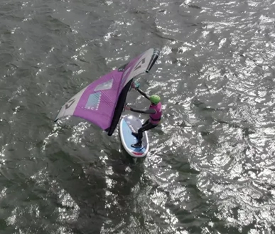 A top view of someone wing surfing.